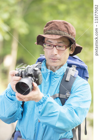 Men taking pictures Men taking pictures 11877082