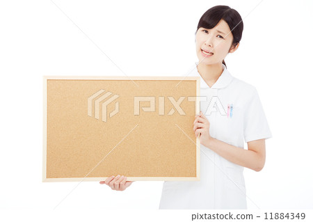 Troublesome nurse holding a message board Troublesome nurse holding a message board 11884349