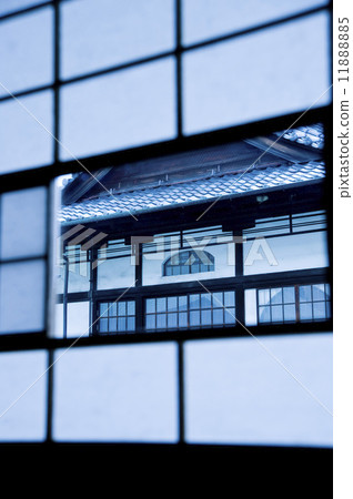 Image of a sliding door through a window 11888885