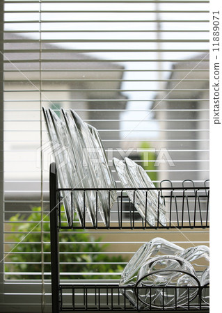 clean dish on a dish rack clean dish on a dish rack 11889071