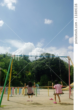 Sisters playing in the swing Sisters playing in the swing 11889116
