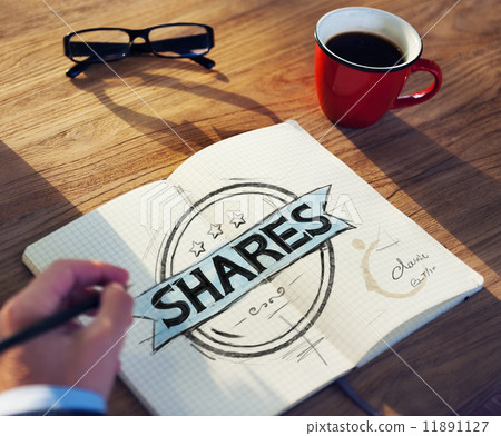 Businessman's table with Shares Concept Businessman's table with Shares Concept 11891127