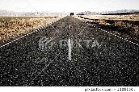 Sepia Toned Picture Of A Road That Leads To The Mountain Ranges 11891503