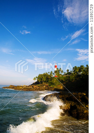 Lighthouse on Coastline at Kovalam 11891729