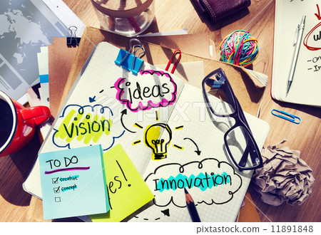 Messy Office Desk with Ideas and Vision 11891848