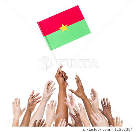 Group Of Multi-Ethnic People Reaching For And Holding The Flag O 11892394