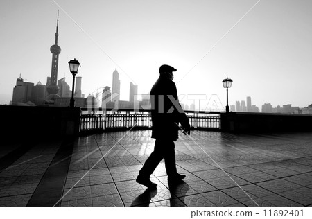 Man walking in Shanghai Man walking in Shanghai 11892401