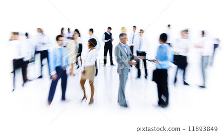 Group Of Business People Working Blurred Motion Indoors Group Of Business People Working Blurred Motion Indoors 11893849