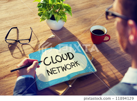 Man Writing Cloud Network Concepts on His Note 11894129
