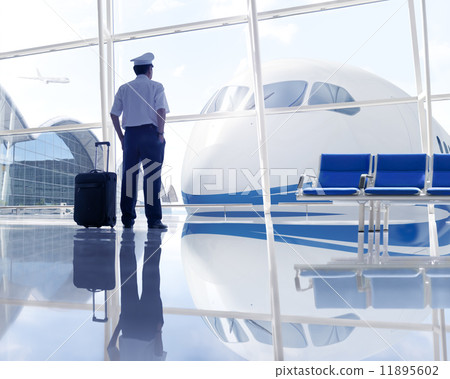 Pilot Waiting in the Airport Pilot Waiting in the Airport 11895602