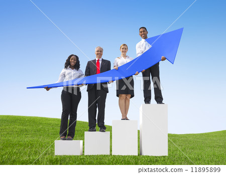 Business People Outdoors Holding Arrows that Shows Progress Business People Outdoors Holding Arrows that Shows Progress 11895899
