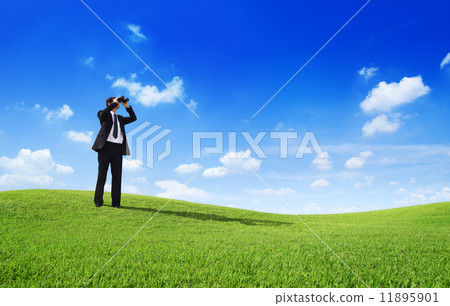 Businessman with binocular Businessman with binocular 11895901