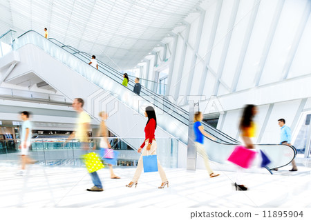 Motion Blurred People in the Shopping Mall 11895904