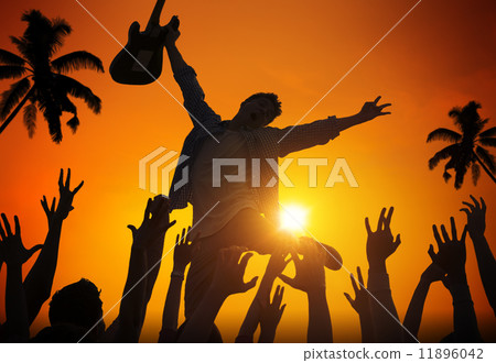 Silhouettes of People in Music Festival by the Beach 11896042
