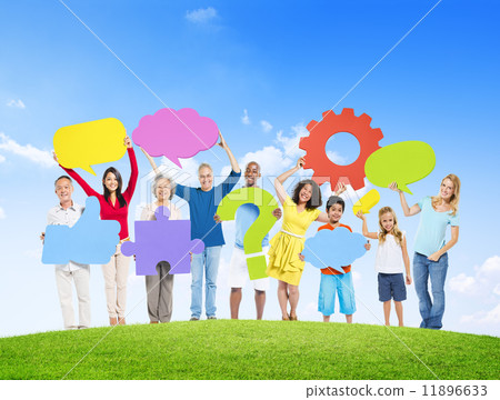 Diverse People Holding Symbols On a Hill Diverse People Holding Symbols On a Hill 11896633