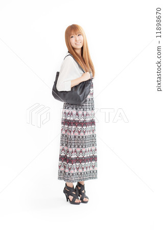 A Cute Girl In Autumn And Winter One Piece Stock Photo