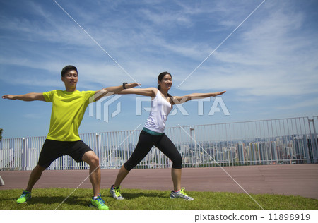 Young Asian Adults exercising Young Asian Adults exercising 11898919