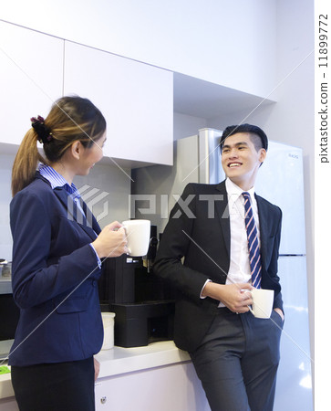 Asian business team taking a break Asian business team taking a break 11899772