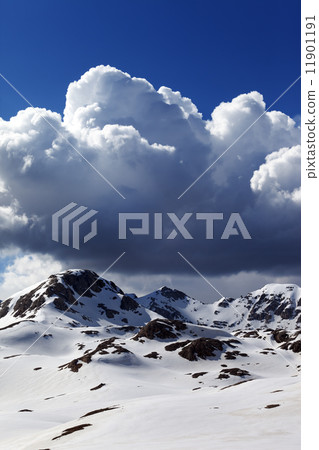 Snowy mountains and sky with clouds Snowy mountains and sky with clouds 11901191
