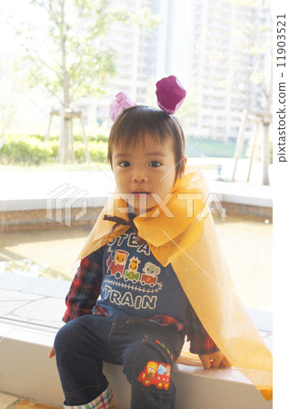 A boy making a costume of Halloween 11903521