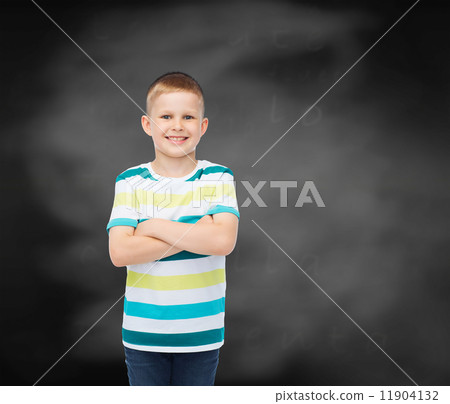 little boy in casual clothes with arms crossed 11904132