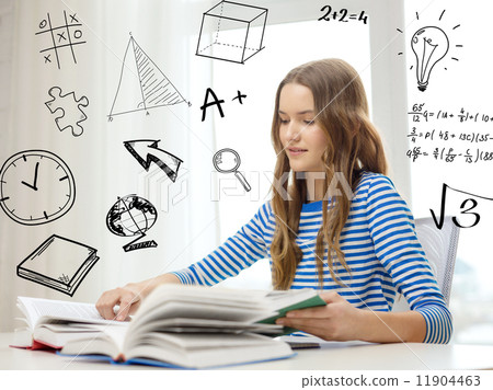 smiling student girl reading books at home smiling student girl reading books at home 11904463