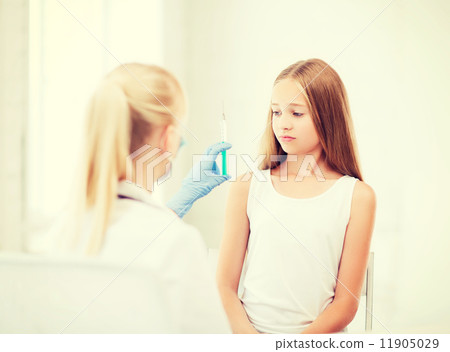 doctor doing vaccine to child in hospital doctor doing vaccine to child in hospital 11905029