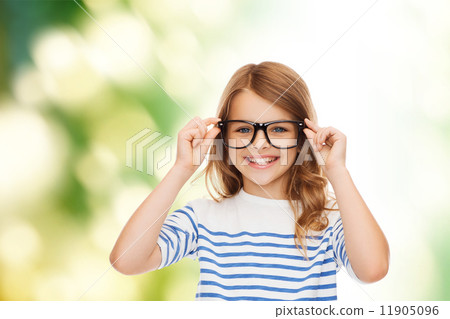 smiling cute little girl with black eyeglasses smiling cute little girl with black eyeglasses 11905096