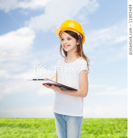 smiling little girl in hardhat with clipboard smiling little girl in hardhat with clipboard 11905484