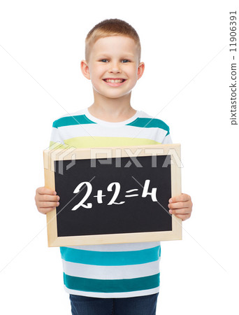 smiling little boy with blank blackboard 11906391