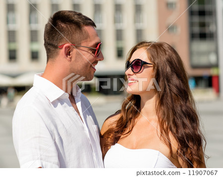 smiling couple in city 11907067