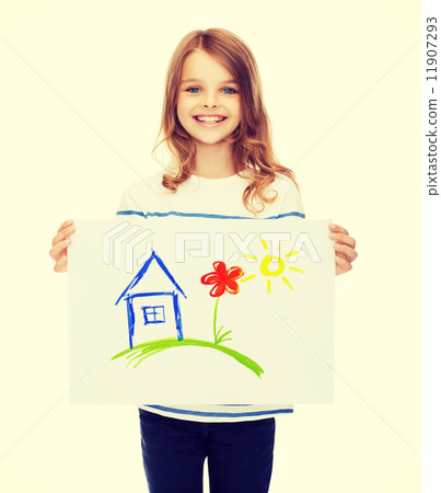 smiling little child holding picture of house smiling little child holding picture of house 11907293