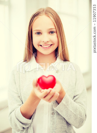 beautiful teenage girl showing red heart beautiful teenage girl showing red heart 11907353