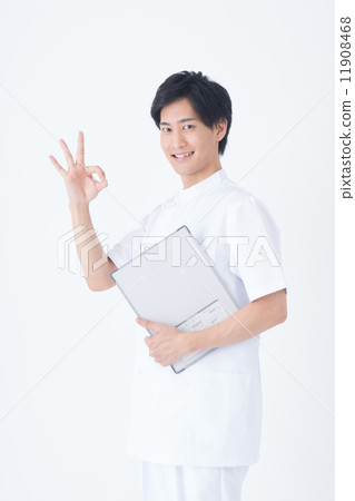 A young man in a white coat 11908468