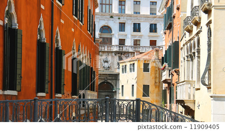 Beautiful houses on a narrow street in Venice, Italy Beautiful houses on a narrow street in Venice, Italy 11909405