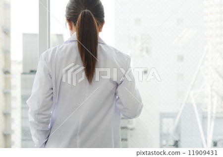 A lady in white A lady in white 11909431