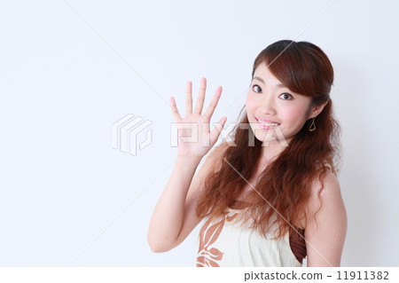 Woman waving hand wearing general image 11911382