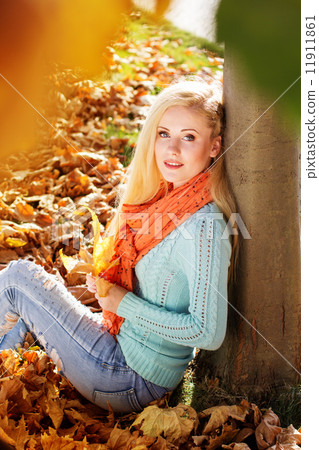 Nice blonde girl in autumn park Nice blonde girl in autumn park 11911861