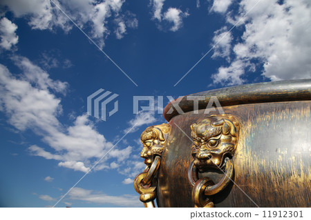 Large bronze bowl to extinguish fire with image Chinese dragon statue in the Forbidden City. Beijing Large bronze bowl to extinguish fire with image Chinese dragon statue in the Forbidden City. Beijing 11912301