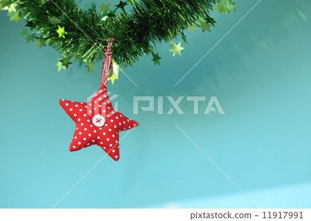 Red heart fabric hanging on glass background 11917991