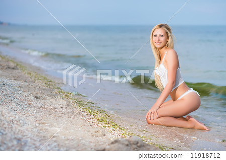 Sexy blond woman in lingerie Sexy blond woman in lingerie 11918712