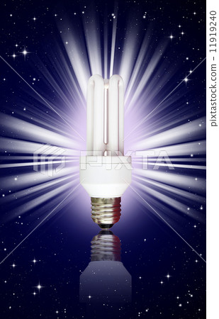 compact florescent light bulb on night sky background 11919240