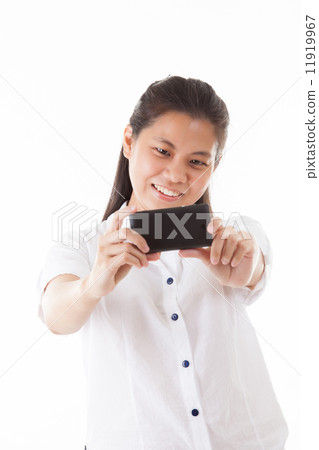 Asian woman using smartphone Asian woman using smartphone 11919967