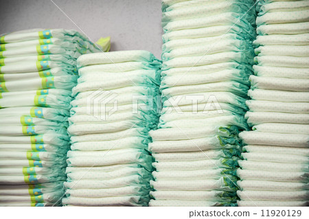 Diapers stacked in a piles Diapers stacked in a piles 11920129