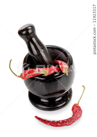 Black marble mortar and pestle with red chilli pepper isolated 11923317