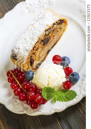 Strudel with apples, ice cream and berries. Strudel with apples, ice cream and berries. 11923375