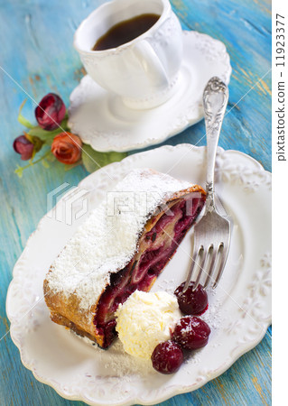 Cherry strudel and coffee. Cherry strudel and coffee. 11923377