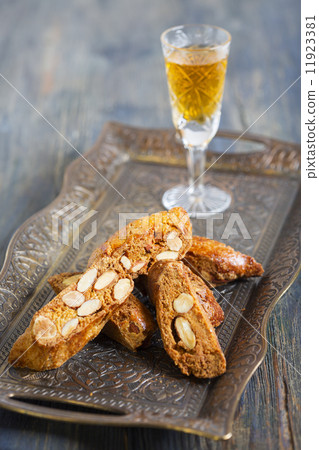 Biscotti and a glass of liquor. Biscotti and a glass of liquor. 11923381