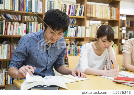 Students studying in the library Students studying in the library 11926248