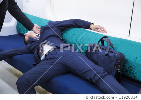 Businessman who is drunk by train Businessman who is drunk by train 11926314